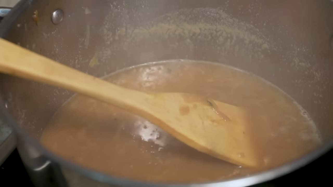 Emulsionando la mantequilla en la sopa